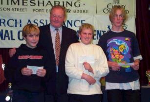 Dr John Bethel presents the team runners-up prize to Geoff Tinkler, Sam Cadamy and Chris Thorpe